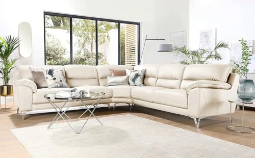 Cream corner sofa set, modern L shaped sectional couch with plush cushions, sleek metal legs, and neutral pillows for contemporary living room décor.