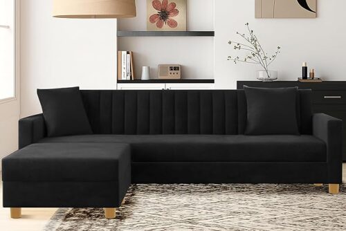 Modern L shaped sectional sofa in luxurious black velvet with tufted backrest, right-hand chaise, and wooden legs — a stylish corner couch for living room or office décor.